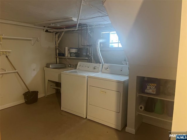 laundry area with laundry area and independent washer and dryer