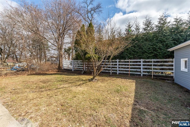 view of yard with fence