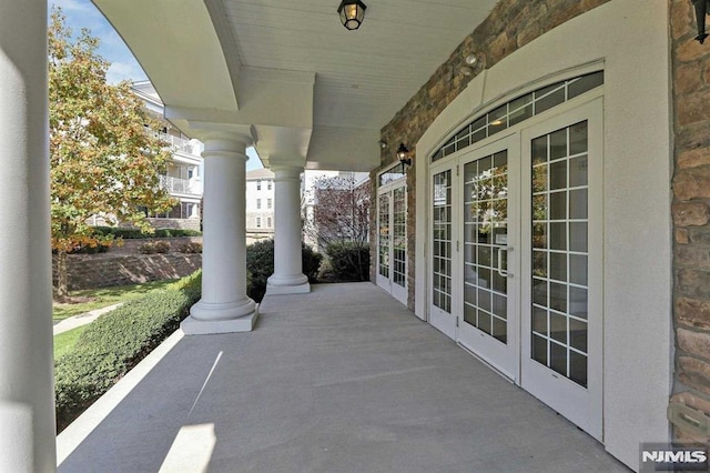 view of patio / terrace with covered porch and french doors