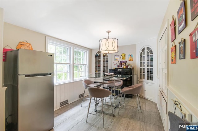 dining area featuring visible vents