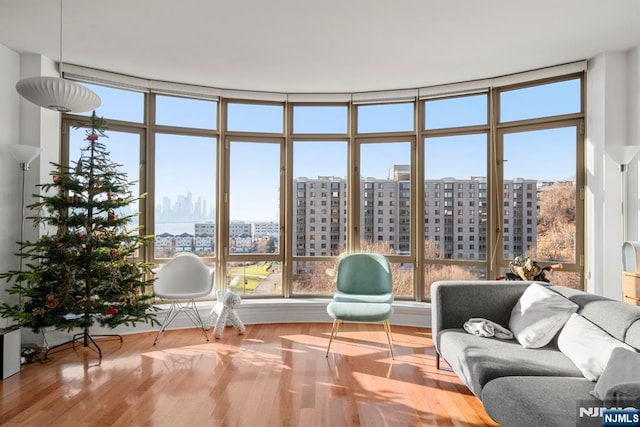 sunroom / solarium with a city view