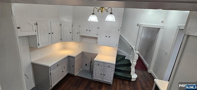 35 James St, Newark, NJ 07102 - kitchen featuring gray cabinetry, light countertops, dark wood-type flooring, and white cabinets