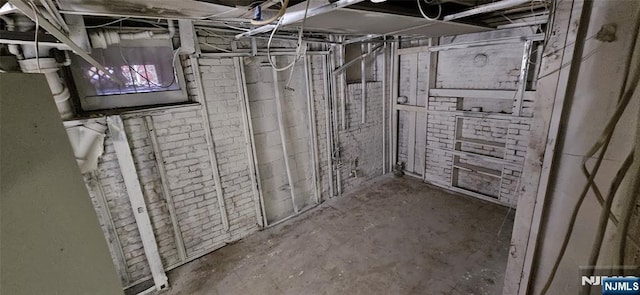 35 James St, Newark, NJ 07102 - unfinished below grade area featuring brick wall