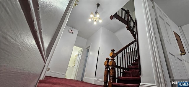 35 James St, Newark, NJ 07102 - stairs with visible vents, baseboards, and an inviting chandelier