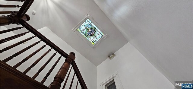 35 James St, Newark, NJ 07102 - stairway featuring a towering ceiling