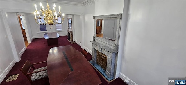 35 James St, Newark, NJ 07102 - interior space featuring crown molding, visible vents, a notable chandelier, and baseboards