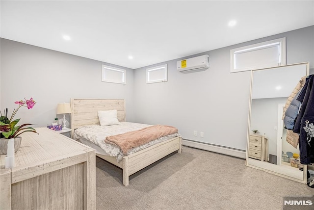 bedroom with carpet floors, a wall unit AC, a baseboard radiator, and recessed lighting