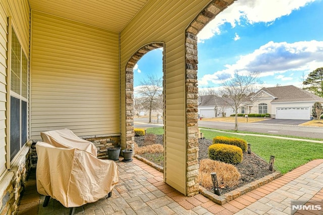 view of patio featuring a residential view