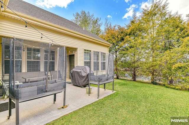 view of yard with a garden and a patio