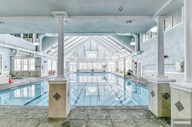 community pool with ornate columns