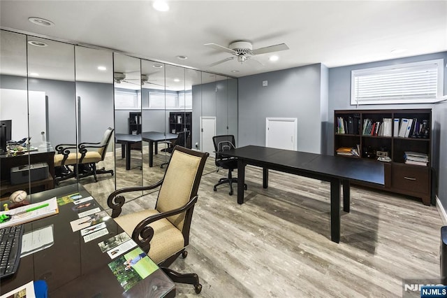 office featuring recessed lighting, ceiling fan, and wood finished floors