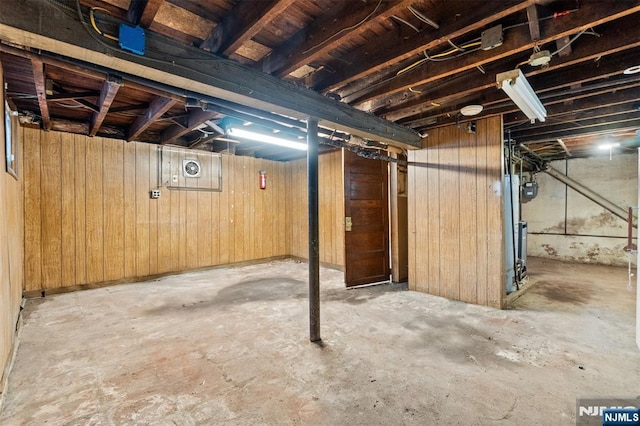 unfinished basement with wood walls