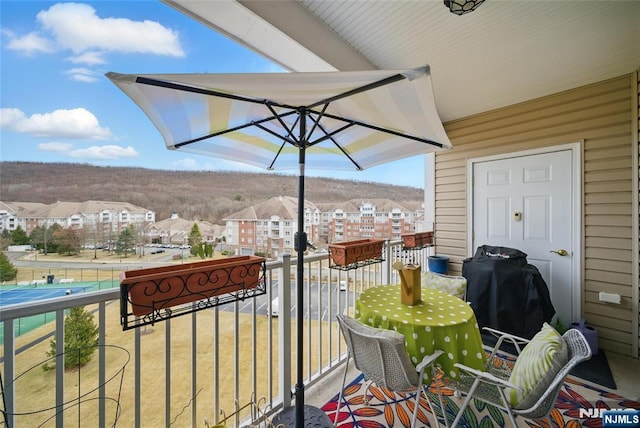 balcony featuring a residential view