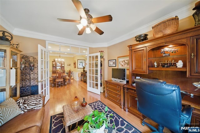 home office with ceiling fan with notable chandelier, french doors, light wood-style flooring, and crown molding