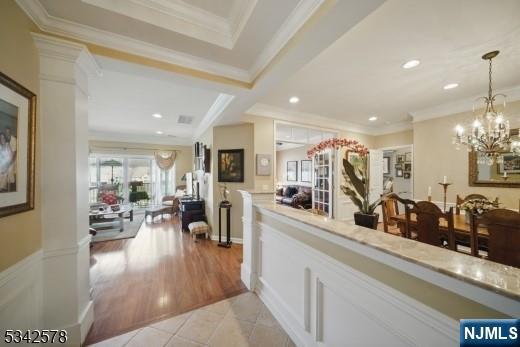 welcome area with a chandelier