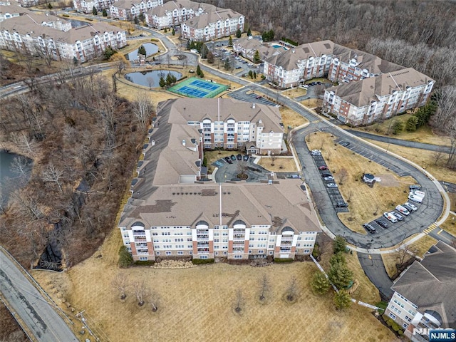 aerial view featuring a water view