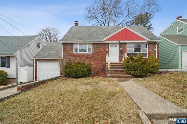 bungalow featuring an attached garage, brick siding, a chimney, and a front yard