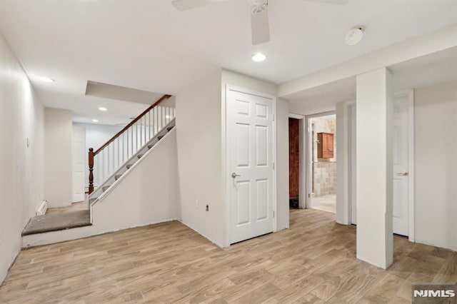 interior space with recessed lighting, stairs, light wood-style floors, and ceiling fan