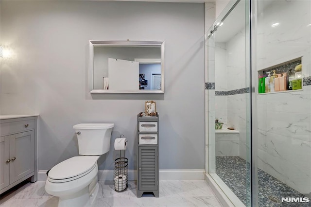 full bath with marble finish floor, a stall shower, toilet, and baseboards