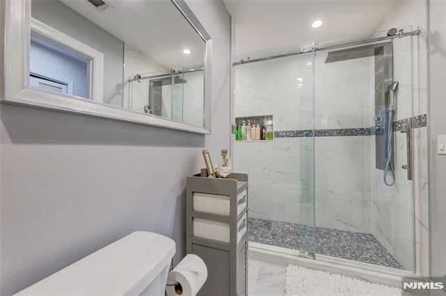 bathroom with marble finish floor, a marble finish shower, recessed lighting, visible vents, and toilet