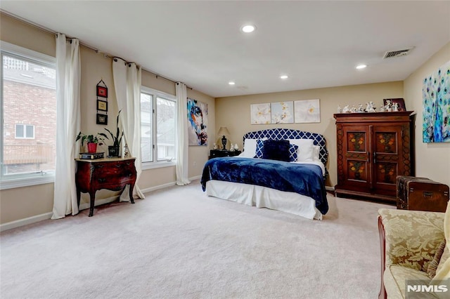 bedroom with baseboards, carpet floors, visible vents, and recessed lighting