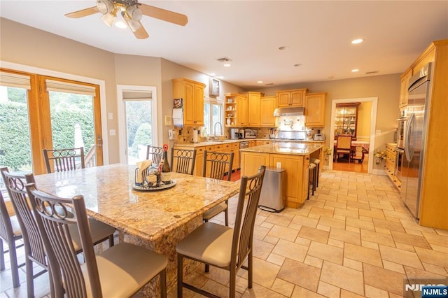 dining space with recessed lighting and visible vents