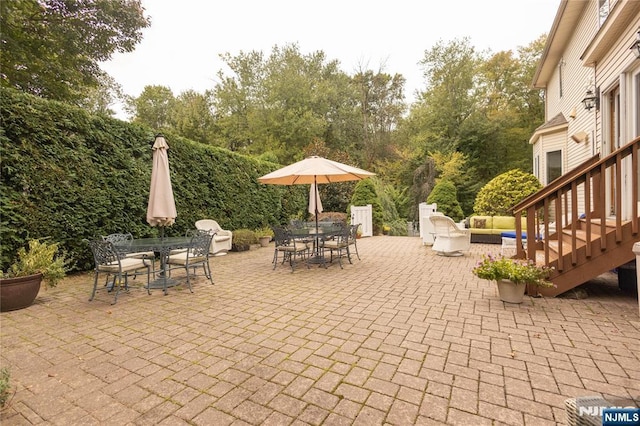 view of patio featuring an outdoor hangout area and outdoor dining area