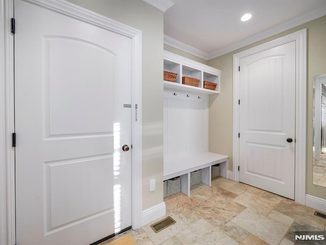 mudroom featuring ornamental molding, recessed lighting, visible vents, and baseboards