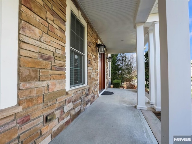 view of patio featuring a porch