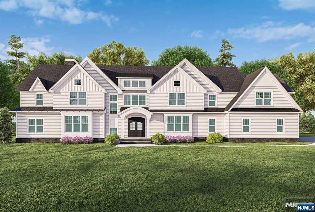 view of front of home featuring a standing seam roof, metal roof, a front lawn, and board and batten siding