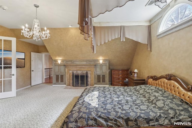 bedroom featuring carpet floors, a brick fireplace, a chandelier, and baseboards