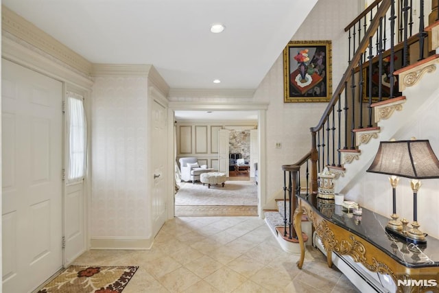 entryway with wallpapered walls, stairs, baseboards, and recessed lighting