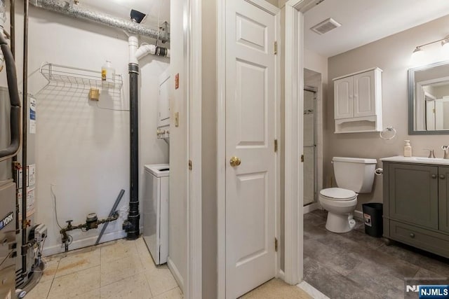 full bath with vanity, visible vents, a stall shower, gas water heater, and toilet