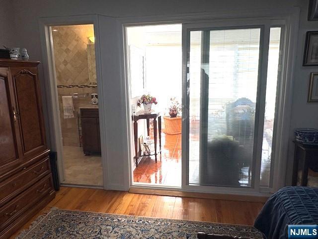 doorway with light wood-style floors