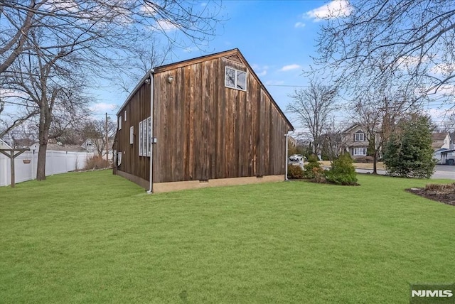 view of outdoor structure with fence