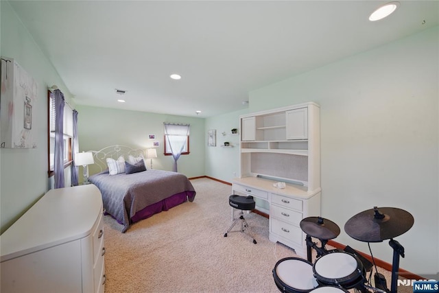 bedroom with recessed lighting, light colored carpet, visible vents, and baseboards