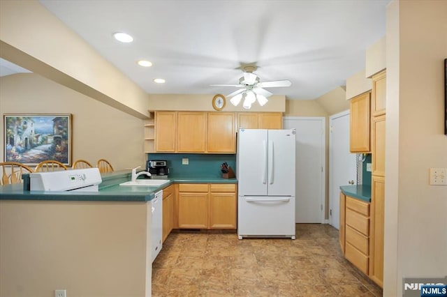 kitchen with ceiling fan, a peninsula, white appliances, a sink, and open shelves