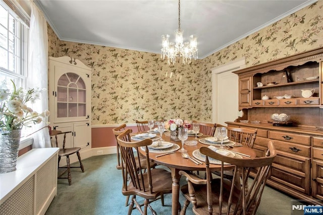 dining area with a chandelier, ornamental molding, and wallpapered walls