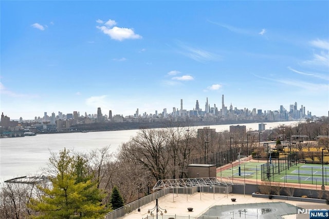 water view featuring a view of city and fence