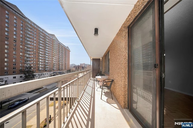 balcony featuring a view of city