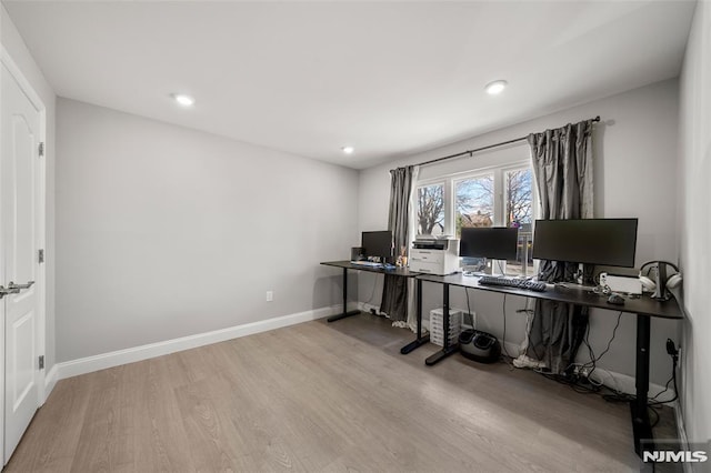 office with recessed lighting, baseboards, and wood finished floors