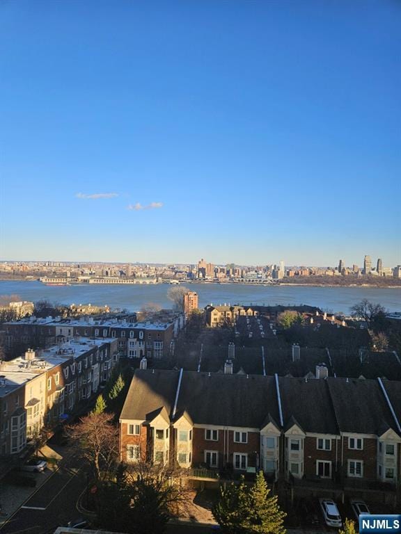 city view with a water view