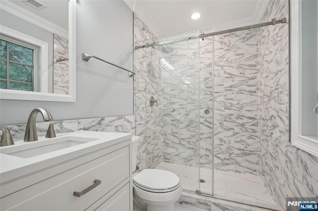 bathroom featuring vanity, a marble finish shower, ornamental molding, tile walls, and toilet