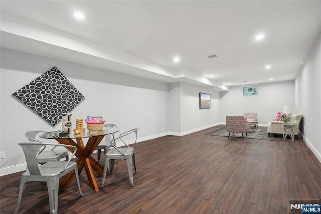 dining space featuring recessed lighting, wood finished floors, and baseboards