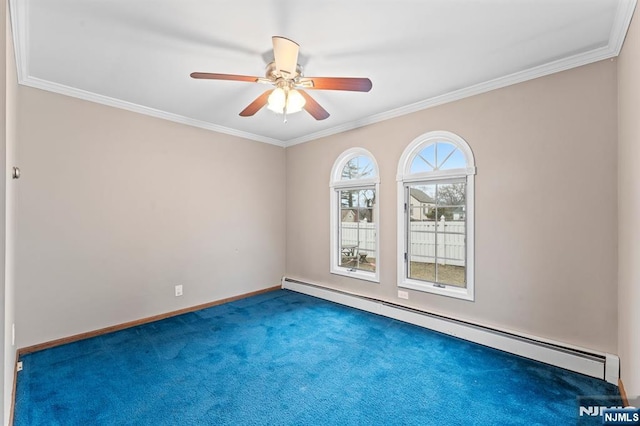 spare room with carpet, a baseboard radiator, ornamental molding, a ceiling fan, and baseboards