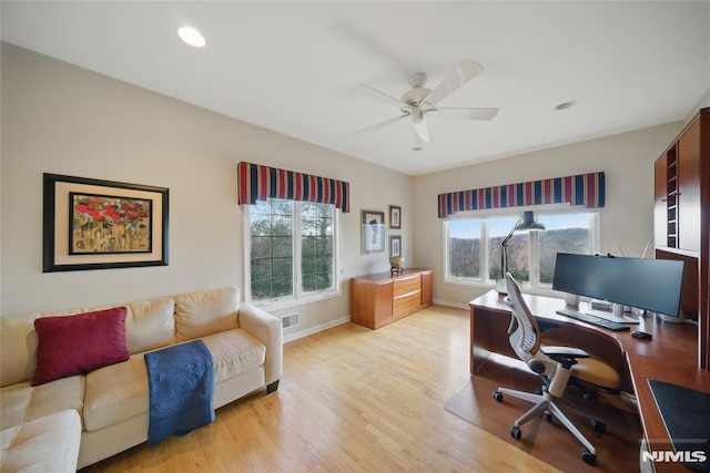 office space with baseboards, visible vents, light wood finished floors, recessed lighting, and ceiling fan