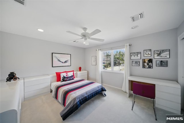 carpeted bedroom with visible vents, recessed lighting, and a ceiling fan