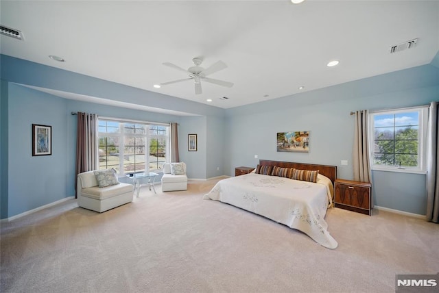 carpeted bedroom with recessed lighting, visible vents, baseboards, and ceiling fan