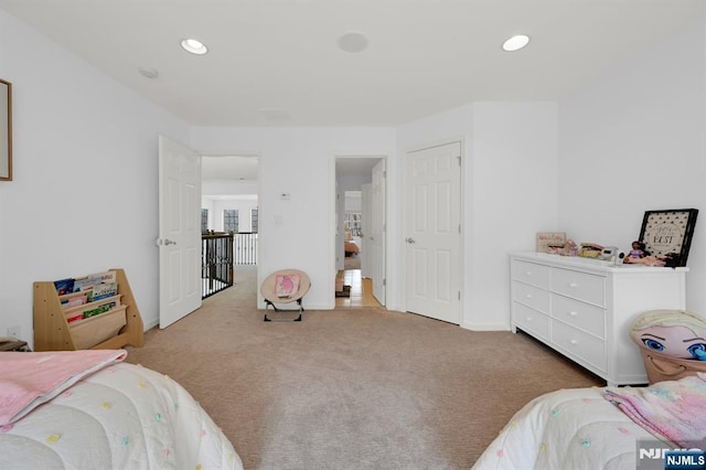 bedroom featuring recessed lighting, baseboards, and carpet flooring