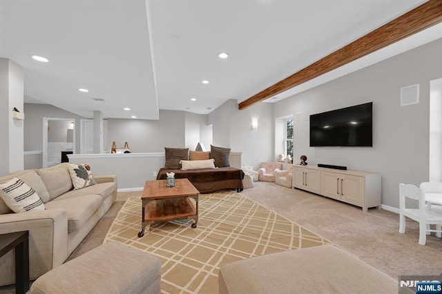 living room featuring baseboards, visible vents, beam ceiling, recessed lighting, and light carpet